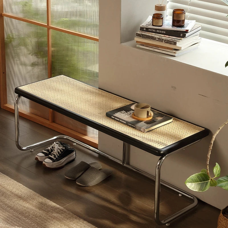 Banc vintage en rotin mur