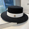 Chapeau femme vintage noir bande blanche
