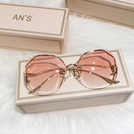 Lunette de soleil vintage femme boite rose