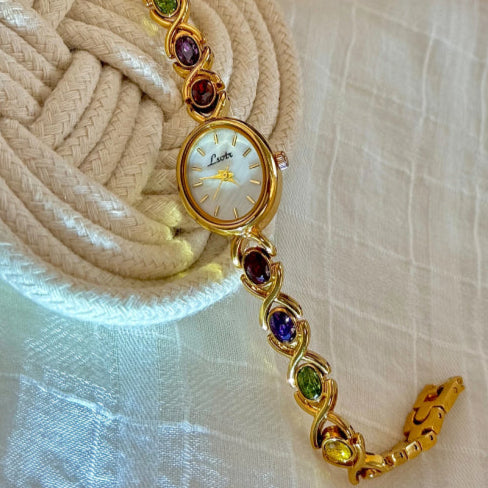 Montre vintage femme petit cadran pierre