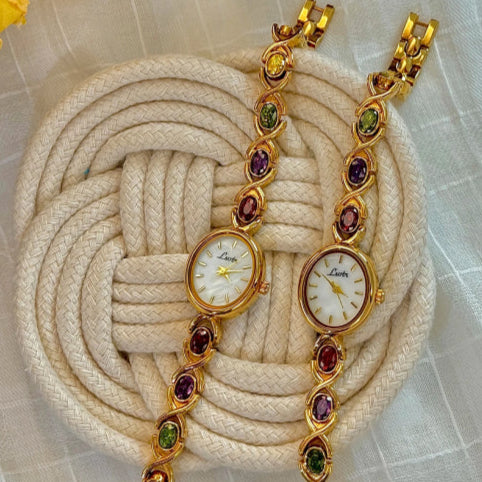 Montre vintage femme petit cadran pierre vert