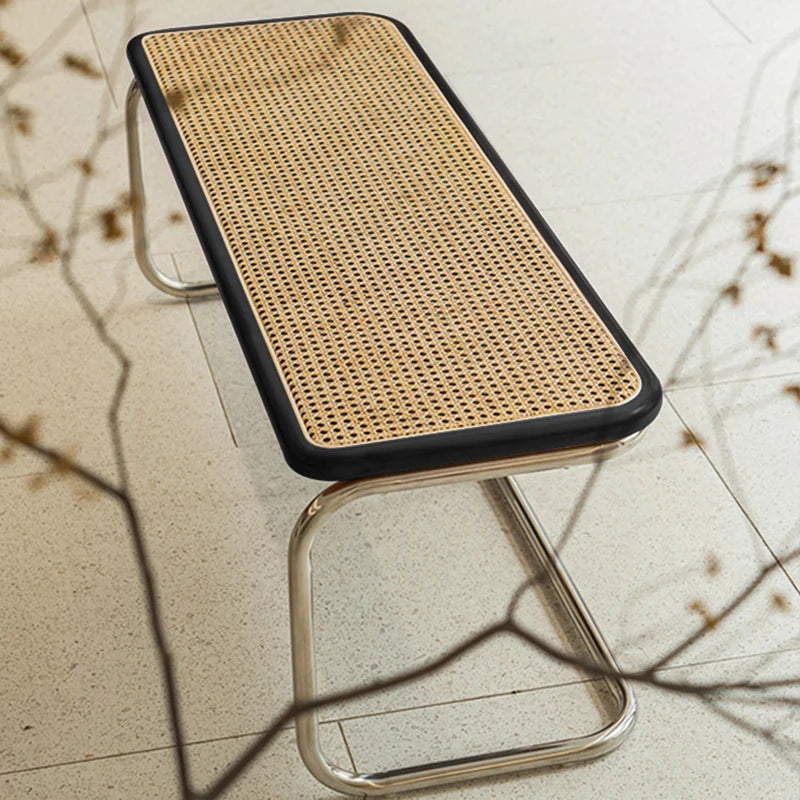 Banc vintage en rotin sol