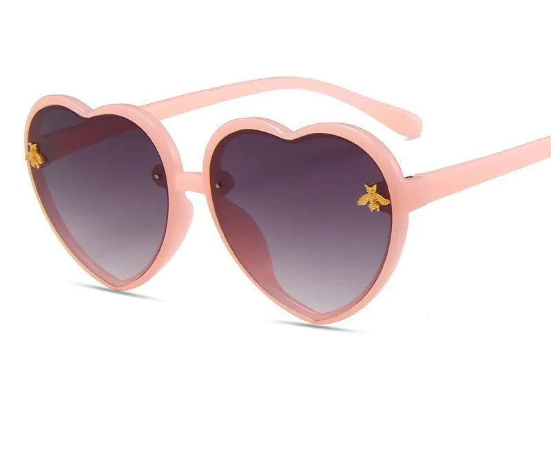 Lunettes en coeur vintage rose