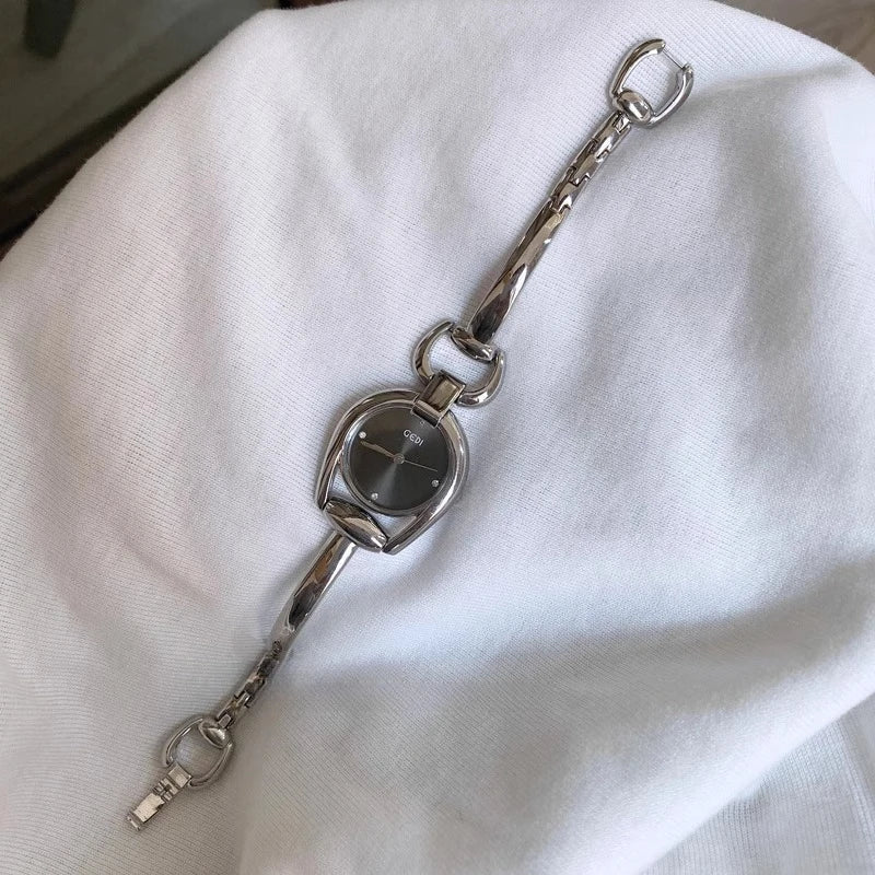 Montre bracelet vintage femme  argent 