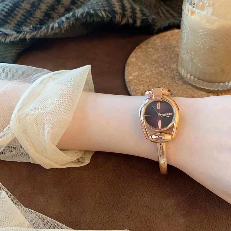 Montre bracelet vintage femme  argent  main  doré noir 