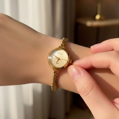 Montre vintage femme luxe rond doré