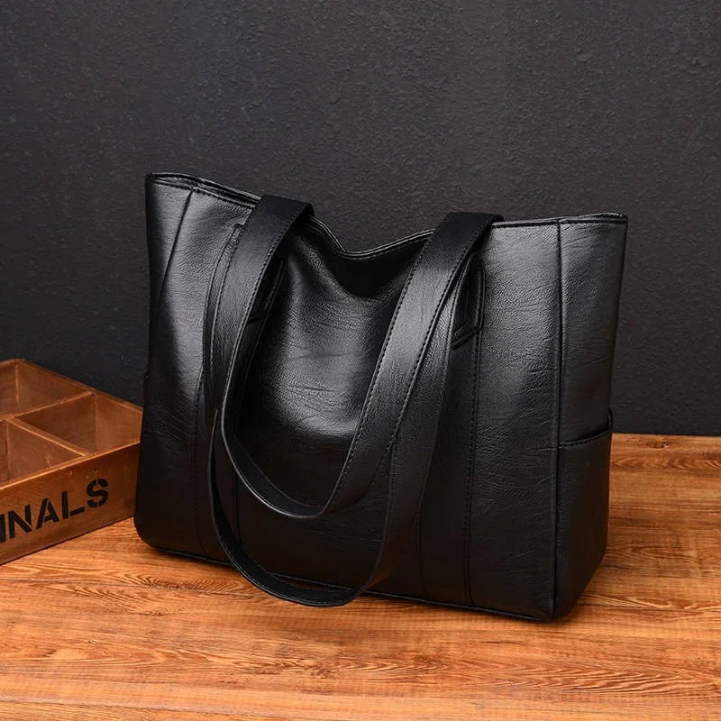 Sac cuir vintage mur noir